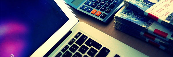 winning-in-slot-games-money-laptop